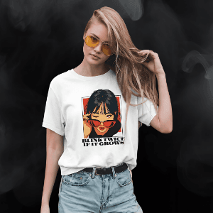 Blink Twice White T-Shirt Model Lifestyle Model wearing a white Blink Twice If It Grows T-shirt with the front artwork visible.
