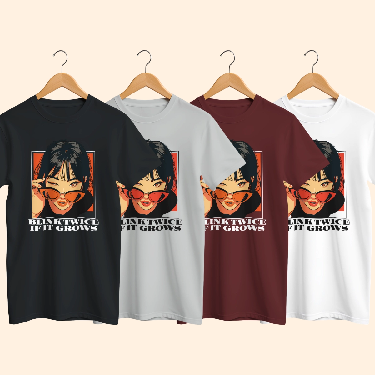 Four Blink Twice If It Grows T-shirts in black, silver, heather maroon and white shown on wooden hangers