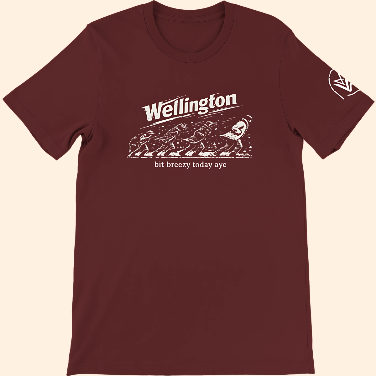 Maroon T-shirt with white Wellington breeze graphic on the front and sleeve logo visible.