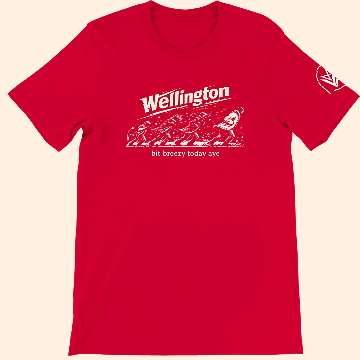 Red T-shirt shown from the front with a Wellington Breezy graphic print on the chest and a sleeve logo.